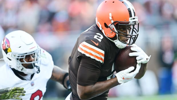 Nov 5, 2023; Cleveland, Ohio, USA; Cleveland Browns wide receiver Amari Cooper (2) runs with the ball after a catch as Arizona Cardinals safety Budda Baker (3) defends during the second half at Cleveland Browns Stadium. 